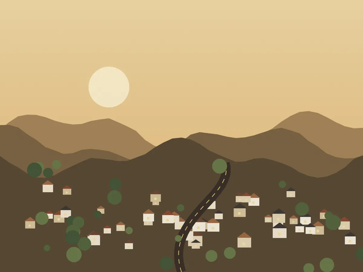 Valley town with a road and surrounding hills